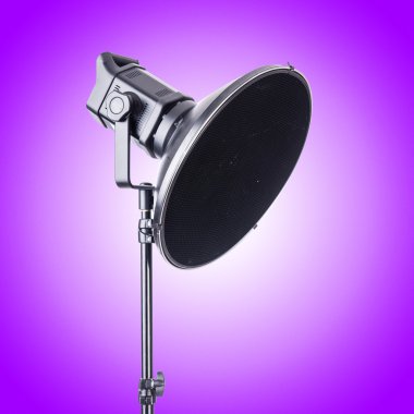 Studio light stand against the gradient clipart