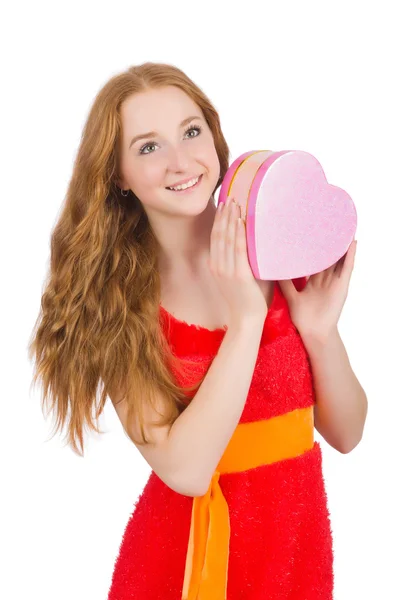 Pretty young girl in red dress holding box — Stock Photo, Image