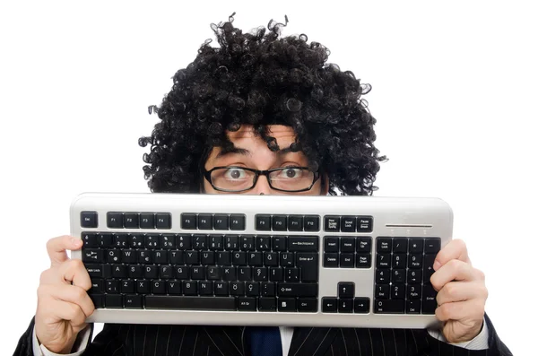 Jovem funcionário com teclado isolado em branco — Fotografia de Stock