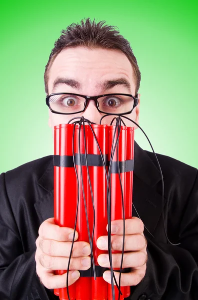 Geschäftsmann mit Dynamit gegen das Gefälle — Stockfoto