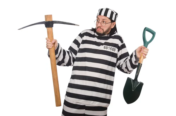 Prison inmate with axe and spade — Stock Photo, Image