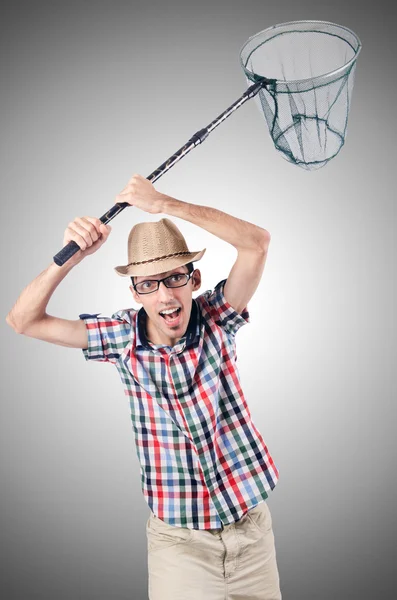 Tuinman met net tegen het verloop — Stockfoto