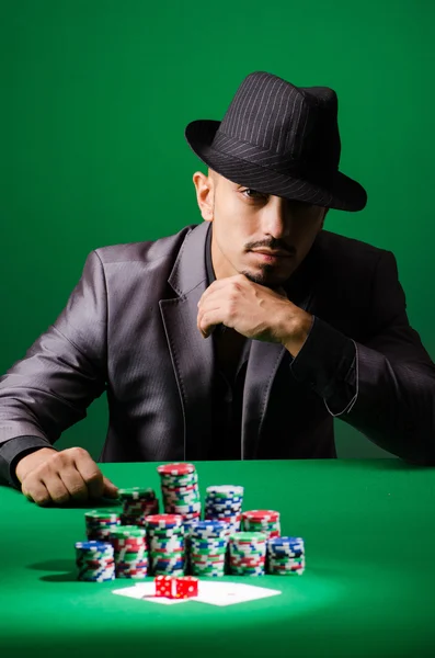 Man playing in casino — Stock Photo, Image