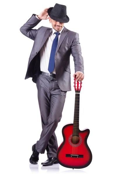 Человек с изолированной гитарой — стоковое фото