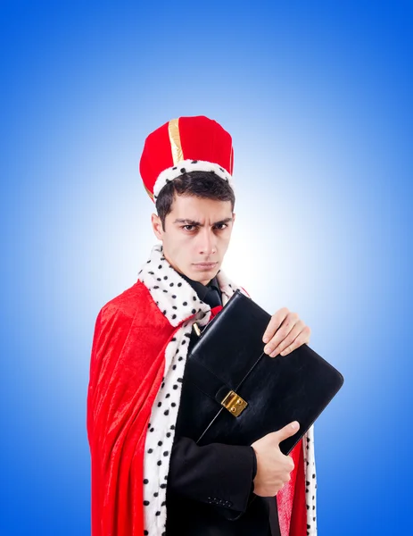 Businessman playing king against the gradient — Stock Photo, Image