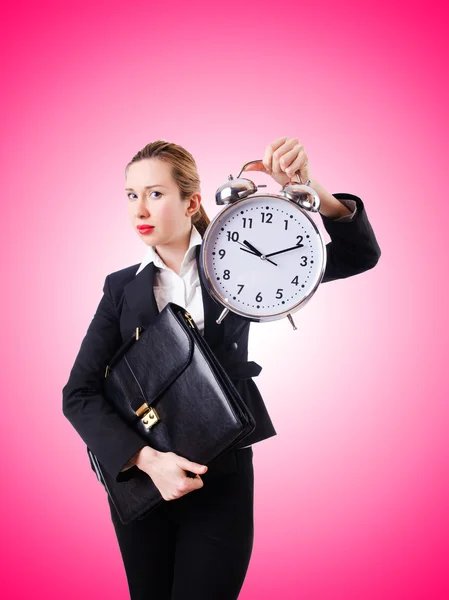 Woman businesswoman with giant clock — Stock Photo, Image