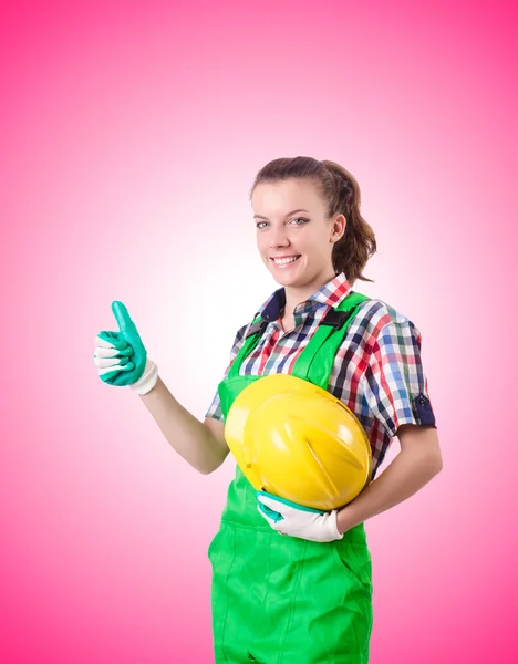 Mulher construtor contra o gradiente — Fotografia de Stock