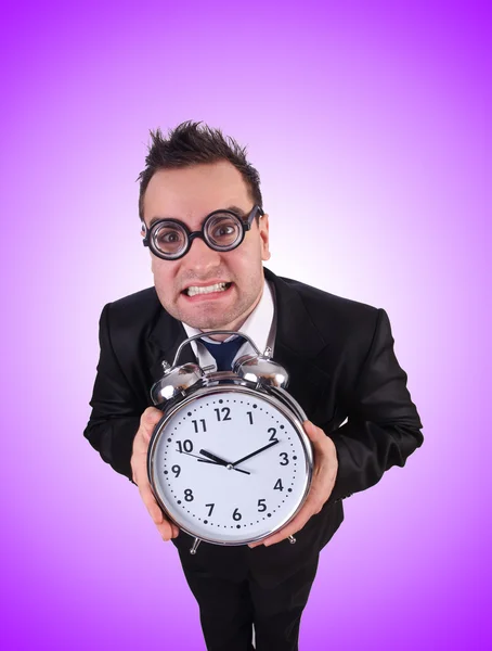 Homme d'affaires avec horloge isolé sur blanc — Photo