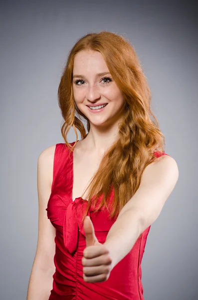 Pretty young girl in red dress — Stock Photo, Image