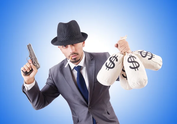 Businessman criminal with sacks of money — Stock Photo, Image