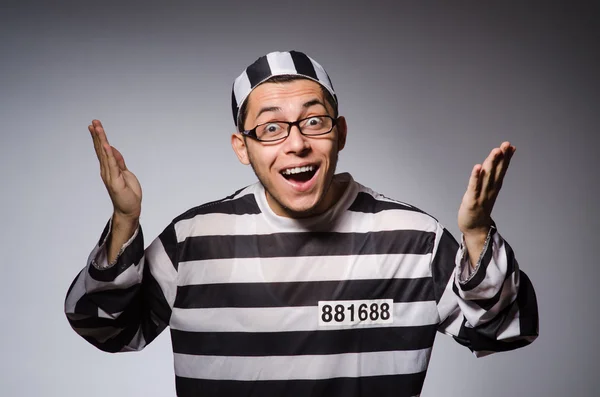 Funny prisoner on gray — Stock Photo, Image