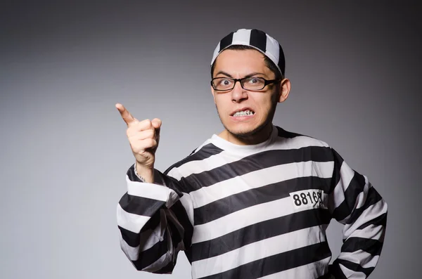 Funny prisoner on gray — Stock Photo, Image