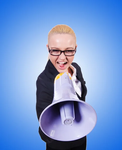 Woman businesswoman with loudspeaker against the gradient — Stock Photo, Image