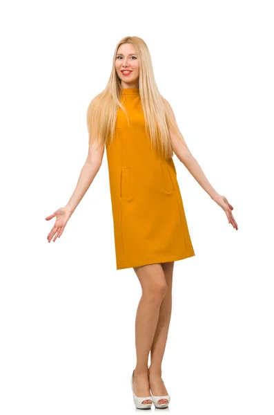 Hübsches Mädchen in ockerfarbenem Kleid auf weißem Grund — Stockfoto