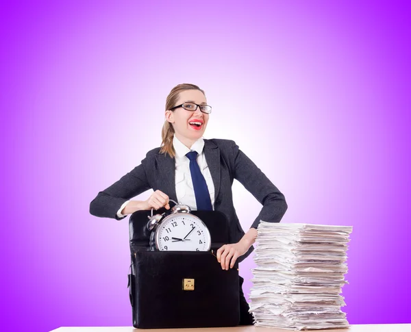 Woman businesswoman with clock and papers