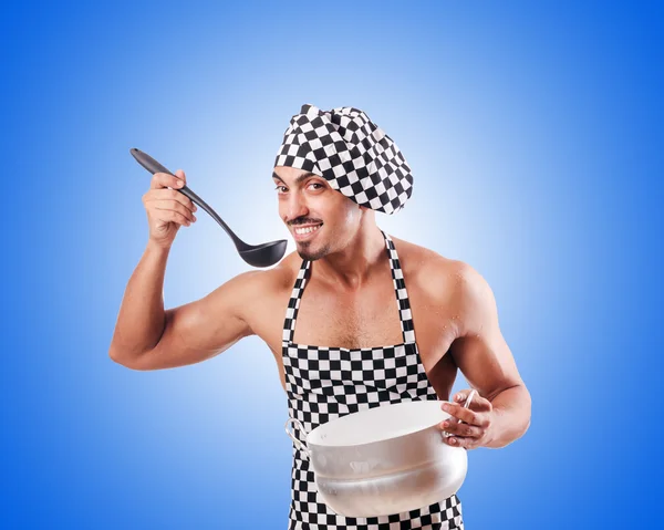 Sexy male cook against the gradient — Stock Photo, Image