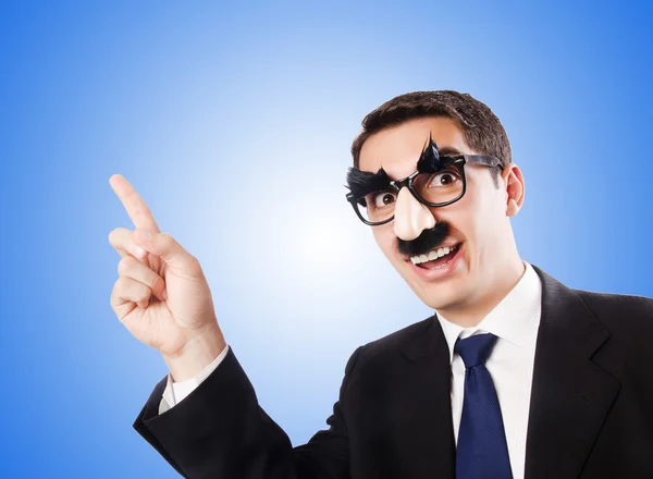 Funny businessman with eyebrows and moustache — Stock Photo, Image