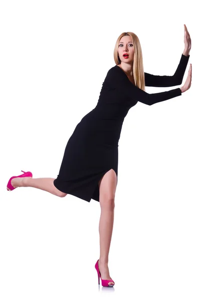 Junges blondes Mädchen im schwarzen Kleid lizenzfreie Stockfotos