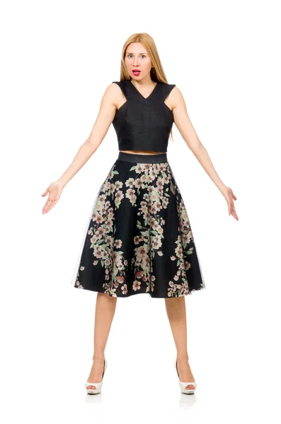 Vrouw in floral donkere rok — Stockfoto