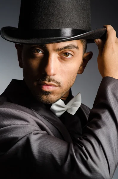 Man with hat in vintage concept — Stock Photo, Image