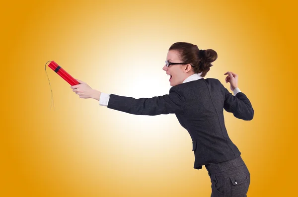 Businesswoman with dynamite — Stock Photo, Image