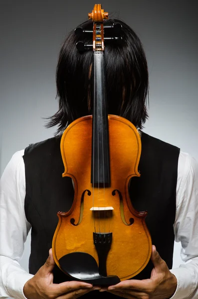 Man viool spelen in muzikaal concept — Stockfoto