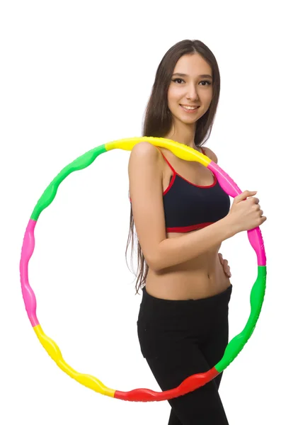 Una ragazza in tuta sportiva con hula hoop isolato su bianco — Foto Stock