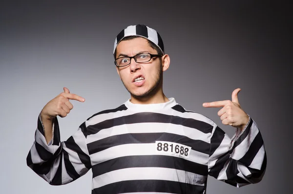 Funny prisoner isolated on gray — Stock Photo, Image