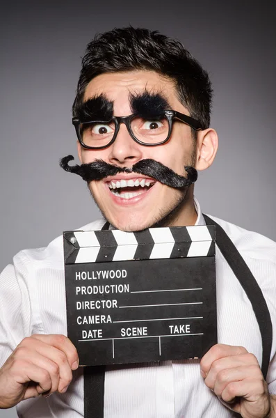 Jovem com bigode falso isolado em cinza — Fotografia de Stock