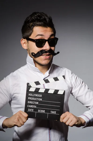 Jonge man in cool zonnebril geïsoleerd op grijs — Stockfoto