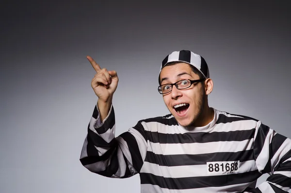 Funny prisoner isolated on gray — Stock Photo, Image