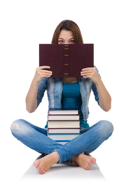 Schülerin mit Büchern auf weiß — Stockfoto