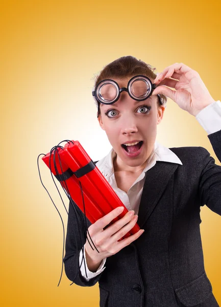 Businesswoman with dynamite against the gradient — Stock Photo, Image