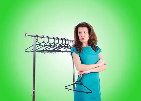 Woman trying new clothing against gradient — Stock Photo, Image