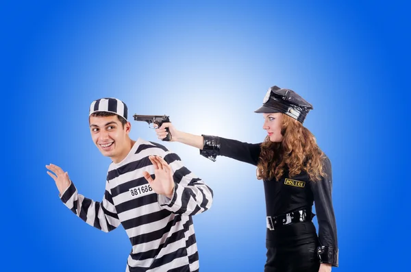 Police and prison inmate against the gradient — Stock Photo, Image