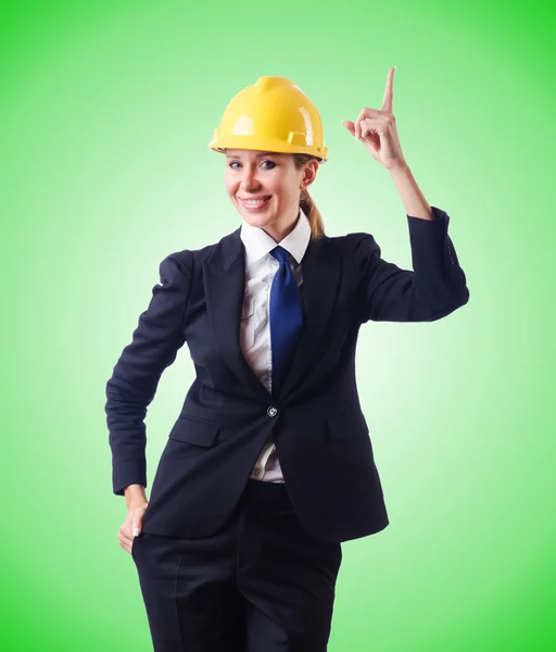 Young businesswoman with hard hat — Stock Photo, Image