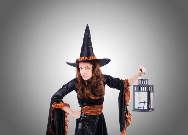 Witch tegen de gradatie achtergrond — Stockfoto
