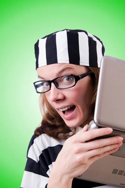 Criminal hacker with laptop against gradient — Stock Photo, Image