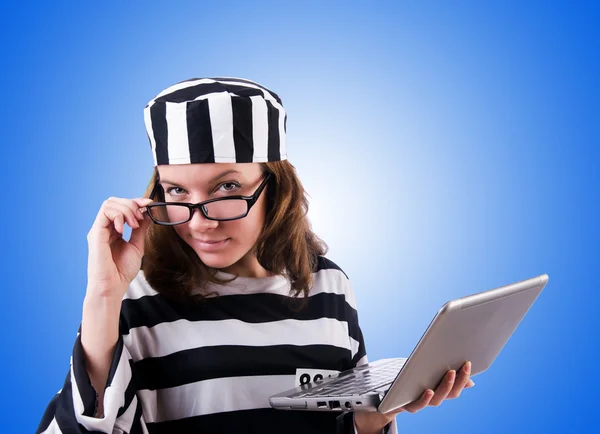 Criminal hacker with laptop against gradient — Stock Photo, Image