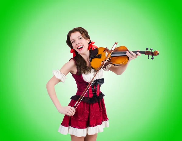 Mujer joven tocando violín contra el gradiente —  Fotos de Stock