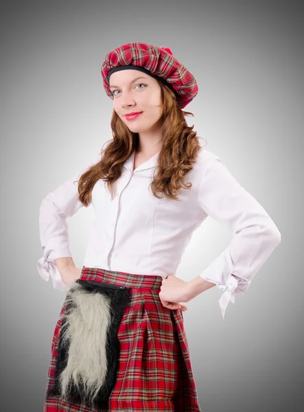 Young woman in traditional scottish clothing — Stock Photo, Image