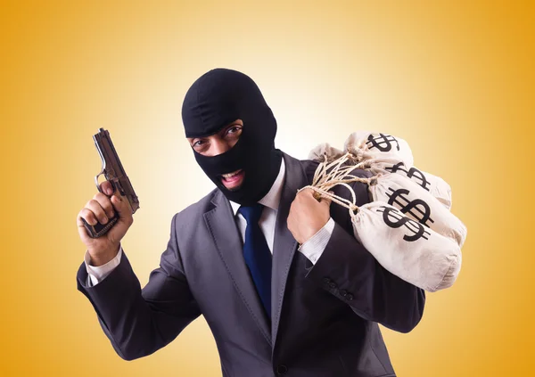 Gangster mit Geldbeutel gegen das Gefälle — Stockfoto