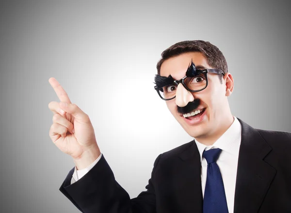 Funny businessman with eyebrows and moustache — Stock Photo, Image