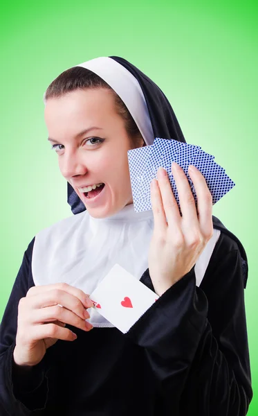 Nun in the gambling concept — Stock Photo, Image