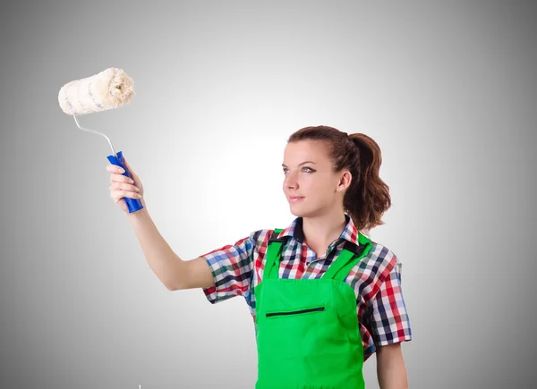 Pintor mujer con pincel contra gradiente —  Fotos de Stock