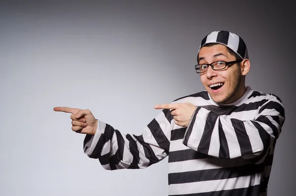 Funny prisoner isolated on gray — Stock Photo, Image