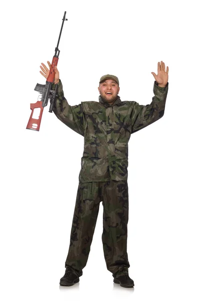 Jovem de uniforme soldado segurando arma isolada em branco — Fotografia de Stock