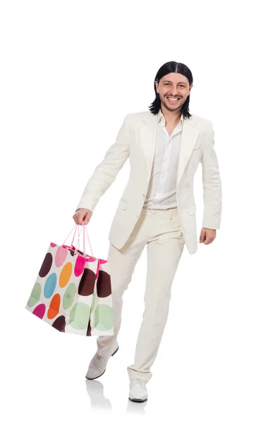 Man med shoppingväskor — Stockfoto