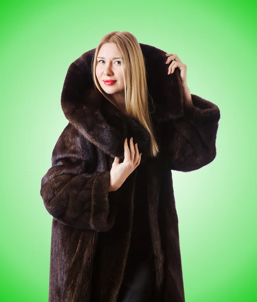 Tall model wearing fur coat — Stock Photo, Image