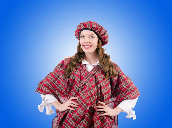 Vrouw in traditionele Schotse kleding — Stockfoto